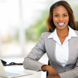 African american businesswoman sitting in office