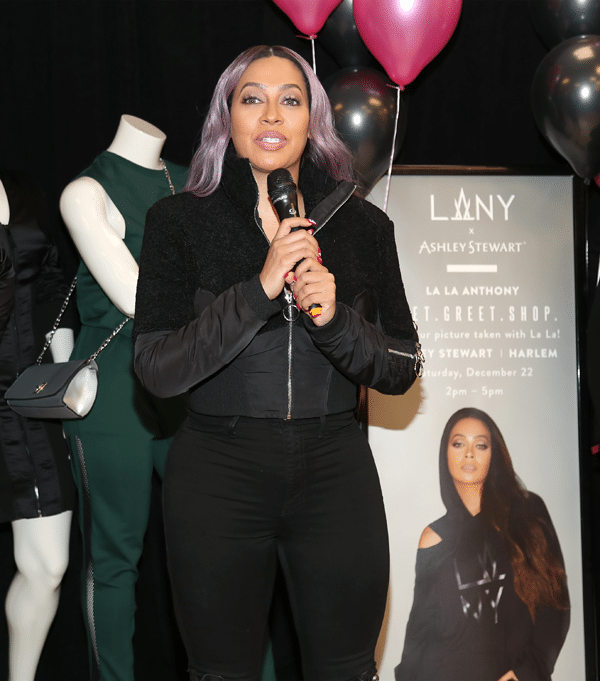 La La Anthony speaking on stage onstage about her clothing line