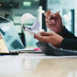 Businesswoman analyzing finances