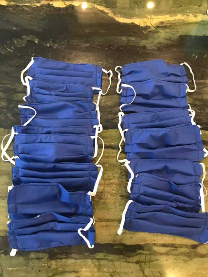 two rows of blue COVID-19 precautionary masks