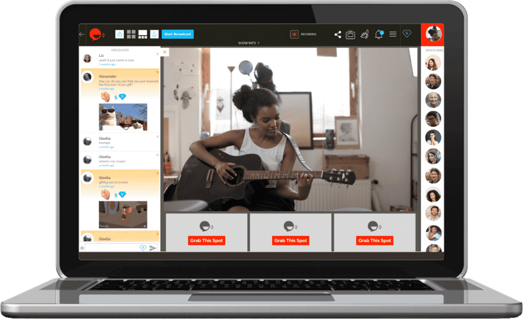 young black woman filming a video while playing guitar