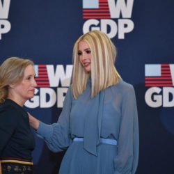 Kelley Currie and Ivanka Trump Speaking at the event wearing blue
