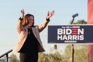 Kamala Harris on stage pink blazer