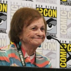 Joye Hummel at a comic-con convention speaking on a pannel.