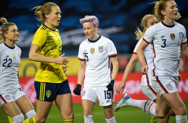 Megan Rapinoe at the U.S. versus Sweden match with teammates on the field