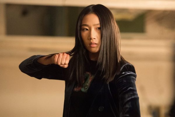 Olivia Liang as Nicky in “Kung Fu” holding a fist up ready to fight kung fu