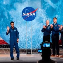 NASA astronaut Jessica Watkins waves at the audience during the astronaut graduation ceremony at Johnson Space Center in Houston, Texas, in January 2020. In April 2022, she will become the first Black woman to live and work on the International Space Station.