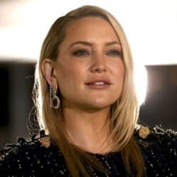 Kate Hudson from the shoulders up, looking into the distance