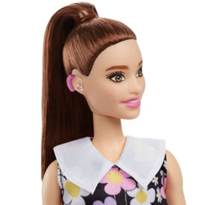 Barbie wearing a hearing aid