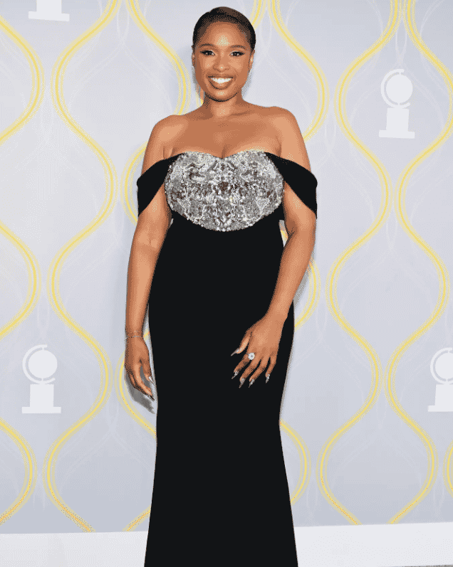 Jennifer Hudson on the red carpet in a black off the shoulder gown