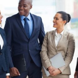 diverse business group walking and talking