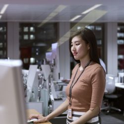 diverse women working on laptop