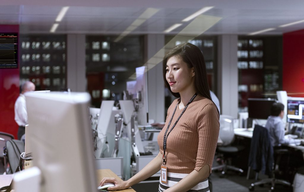 diverse women working on laptop